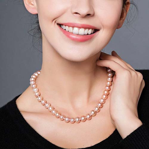  Pink-orange color pearl necklace