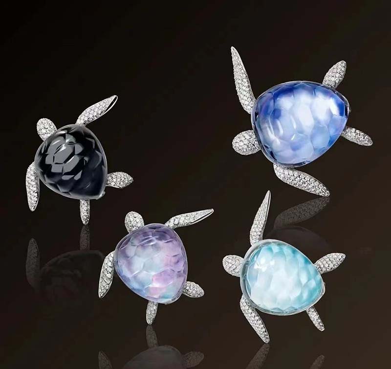 colored stones are all inlaid with crystal quartz